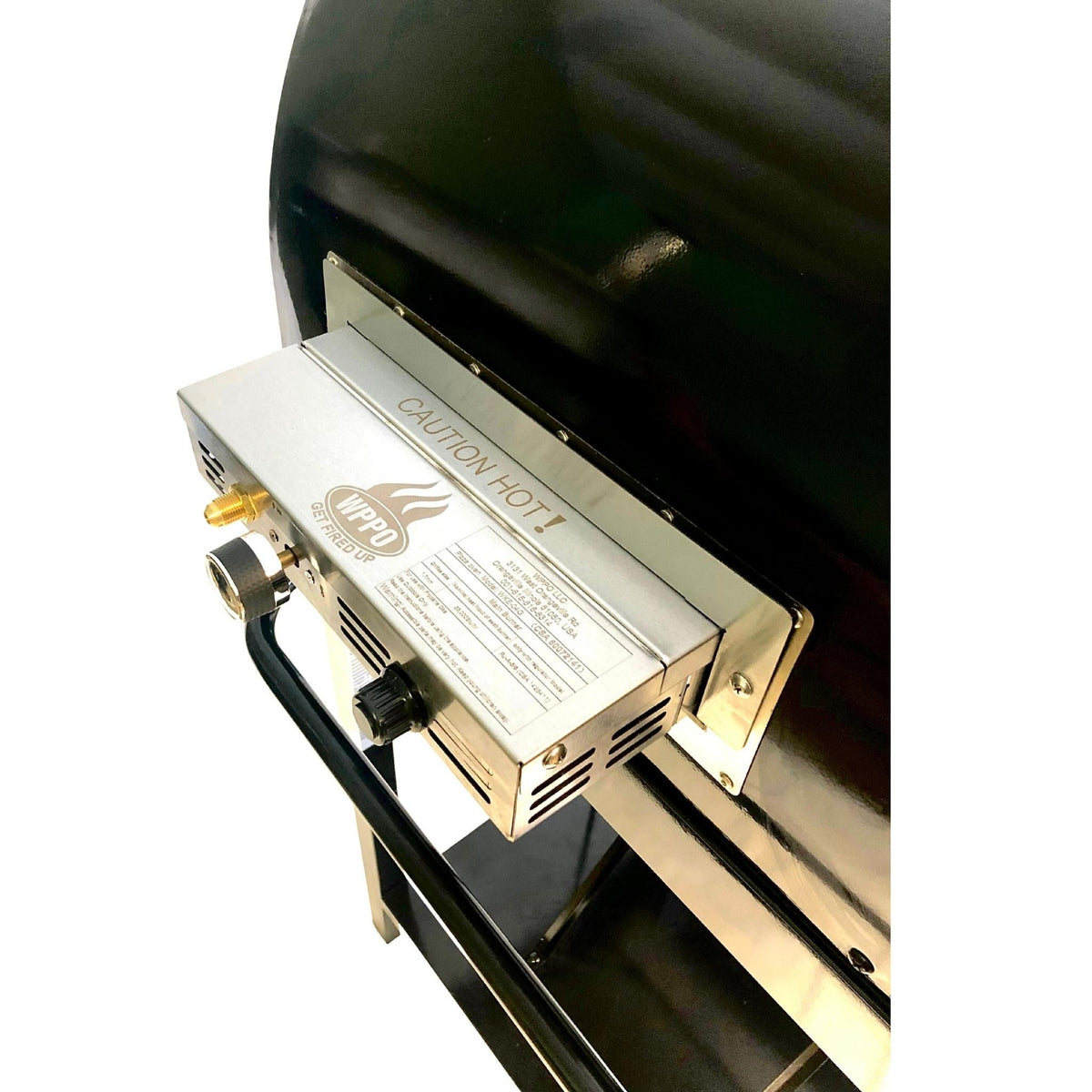 Angled close-up of the side-mounted WPPO gas attachment showing its control knob and hot-surface warning.