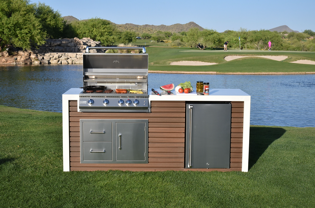 Front view of the Kokomo waterfall-edge island with open grill, storage drawers and refrigerator.