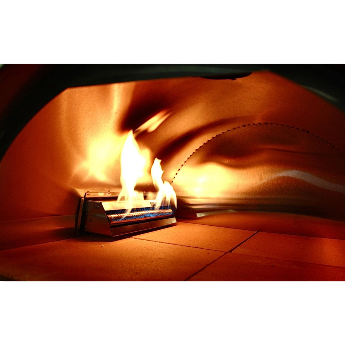 Gas burner flames inside the oven above the fire brick cooking floor.