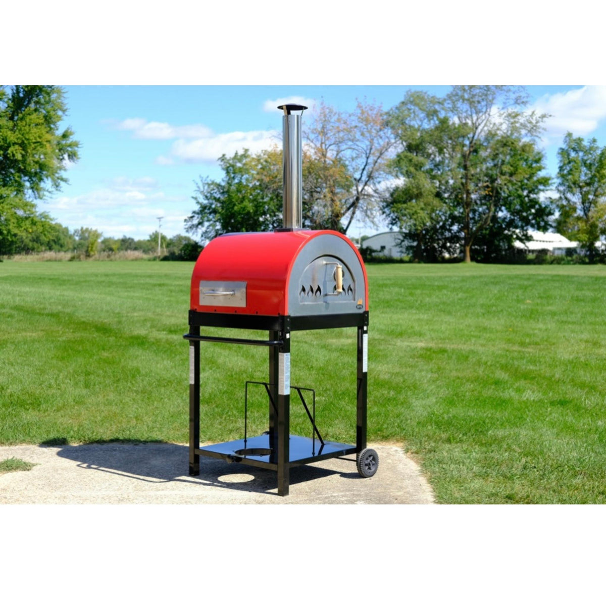 Red WPPO Traditional oven on a wheeled stand outdoors beside a lawn.