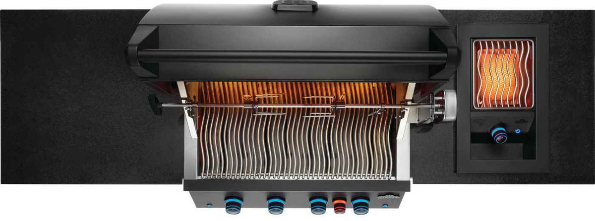 Top view of Napoleon OASIS outdoor kitchen with glowing rear and side infrared burners and installed rotisserie.