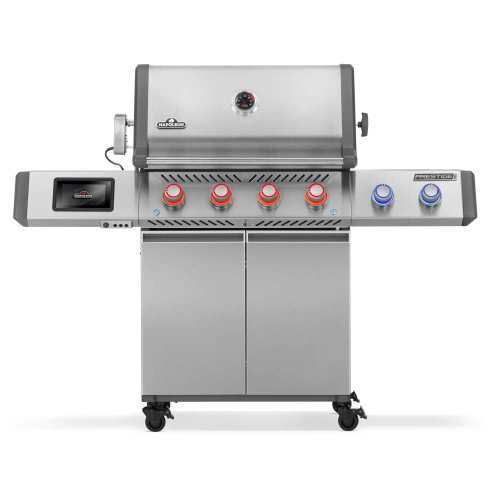 Front view of Napoleon Prestige PRO 500 grill with closed hood, LCD screen, illuminated knobs and cabinet doors.