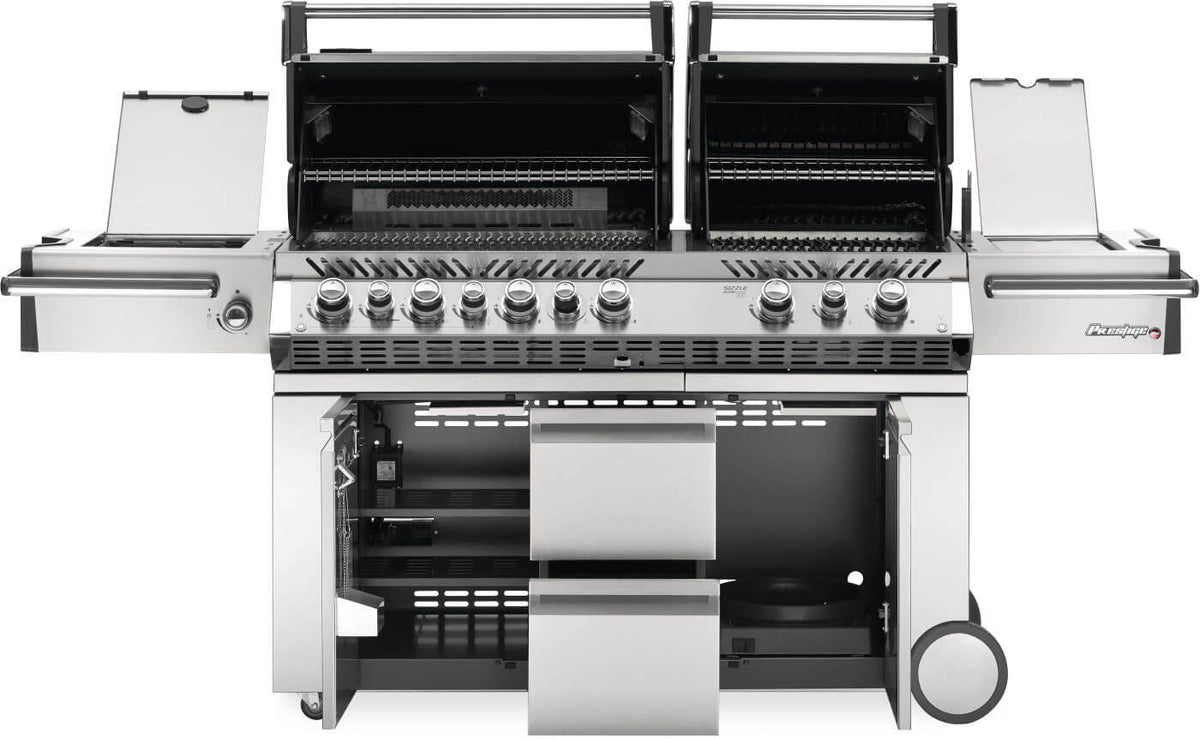 Napoleon Prestige PRO 825 gas grill with both lids, side covers, cabinet doors and storage drawers open.